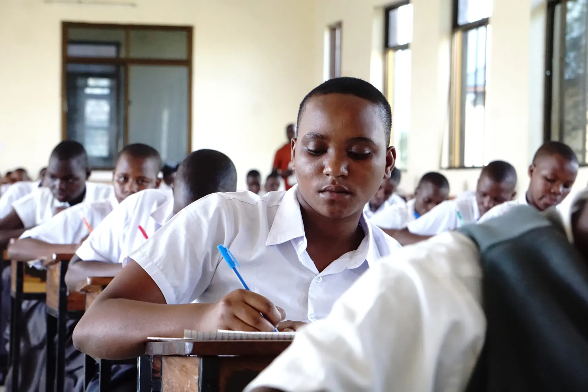 Nursing students studying together with books and notebooks.