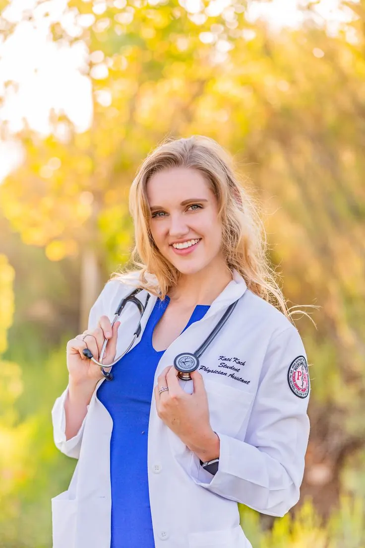 Nursing student holding a stethoscope.